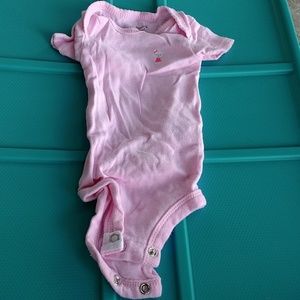 Precious Firsts size Newborn onesie.